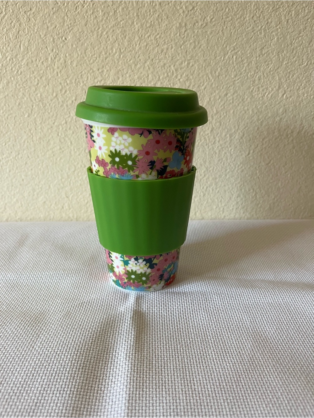 Floral Ceramic  Travel Mug with Green Silicone Lid & Sleeve by DCI